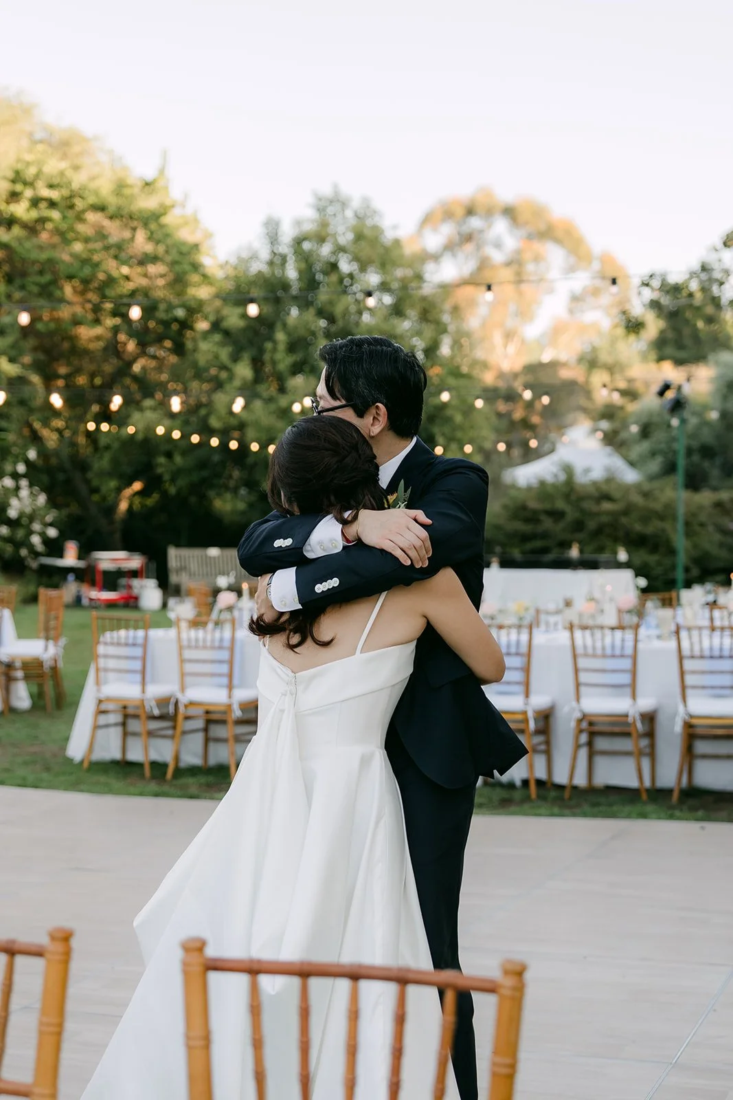 An embrace on the garden dance floor