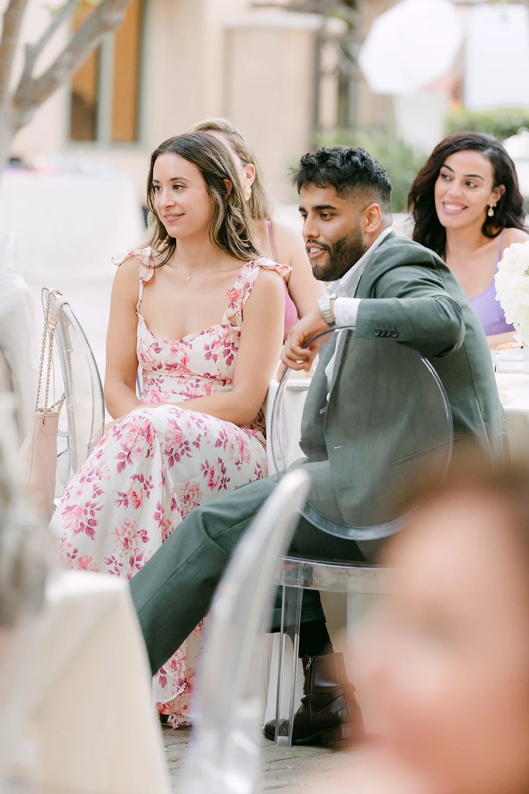 Guests laughing during the toasts