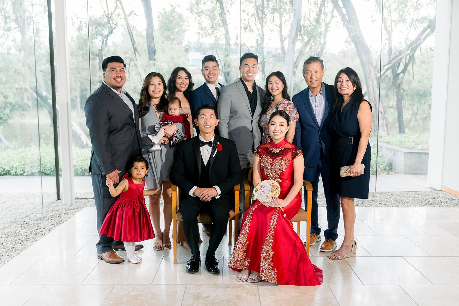 A family photo with Jacinda and Steven in the glass hall