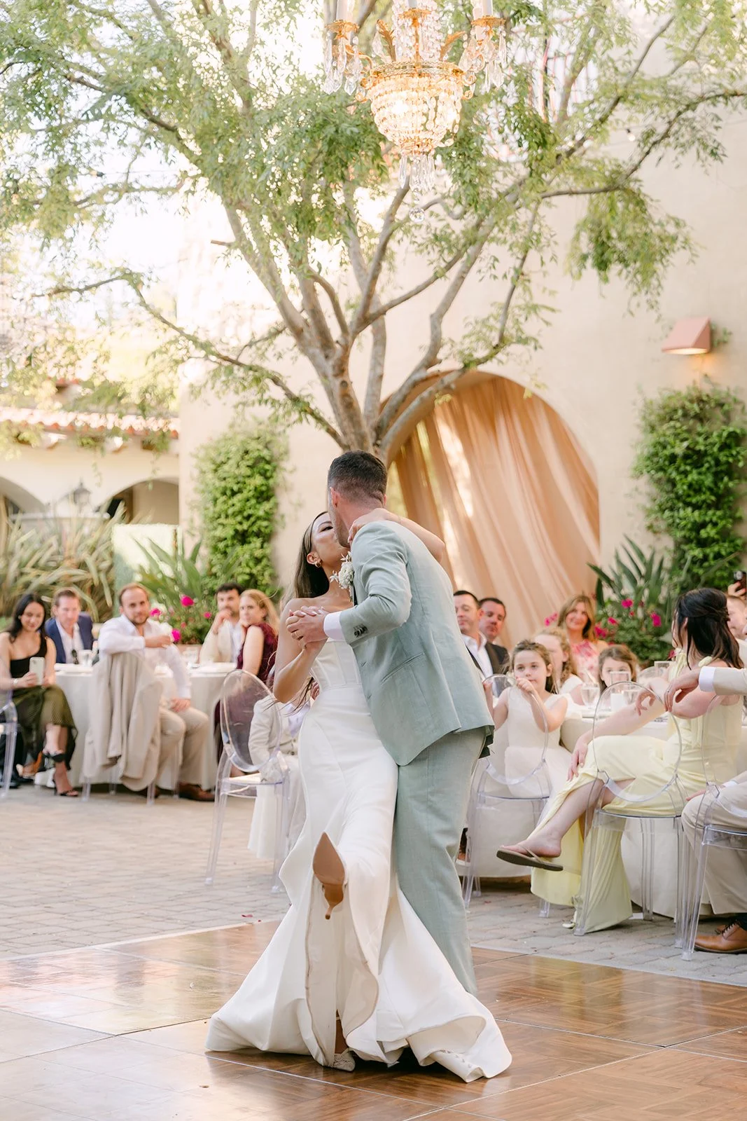 Anthony twirling Kieu during their first dance to Forever by Noah Kahan