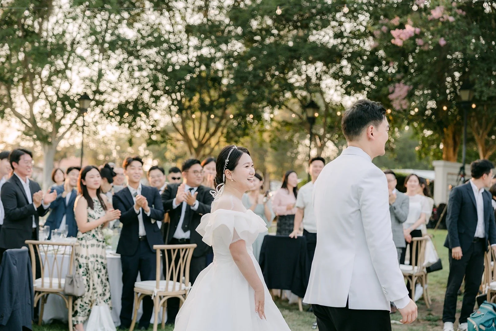 Wide view of the first dance with guests all around