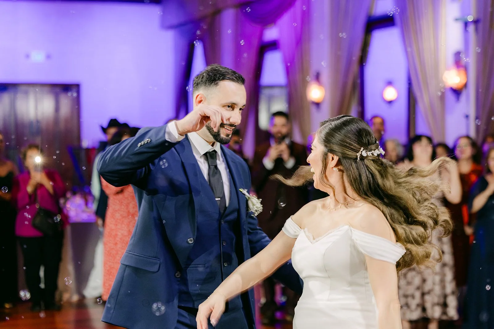 Danny celebrating mid dance as Mariana laughs