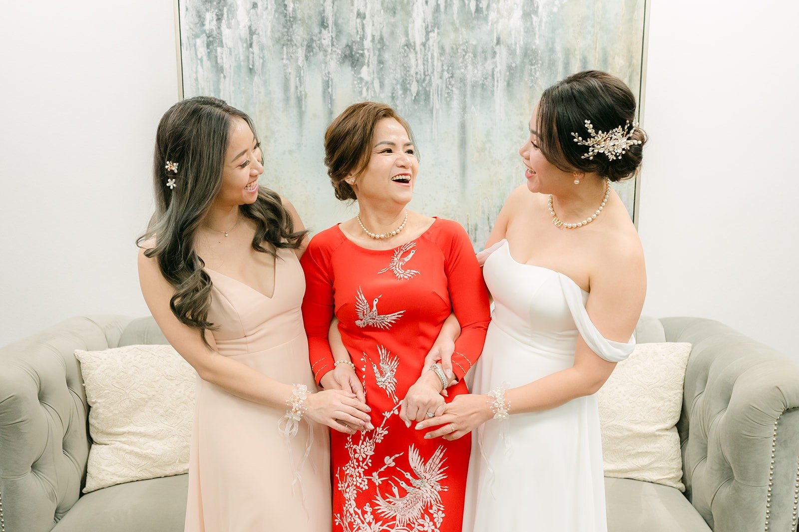 Ivy with Linh and a family member in red before the ceremony