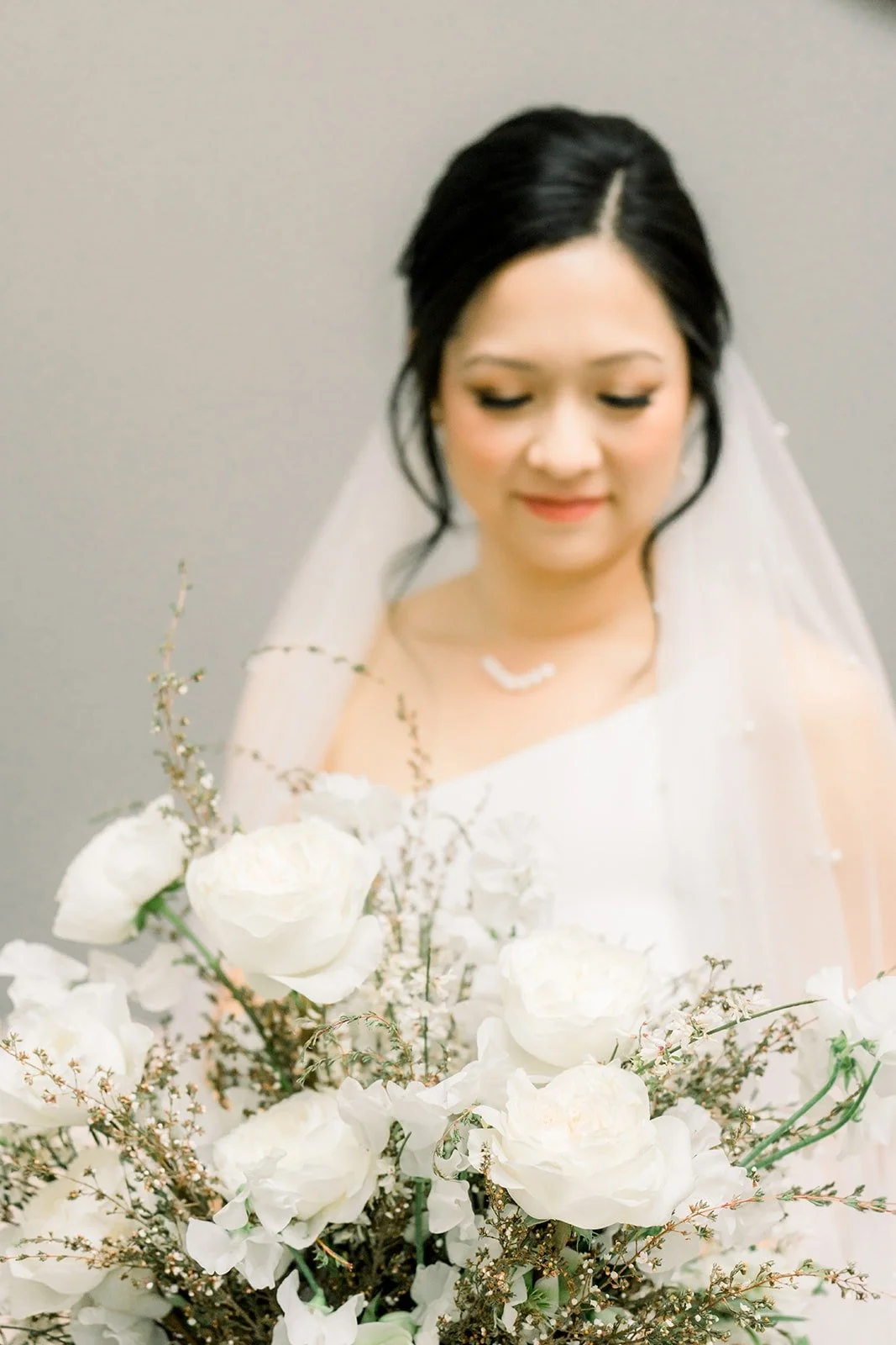 Close portrait of Cindy in her veil