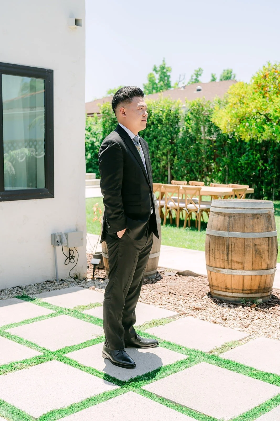 Vincent waiting on the patio for the first look