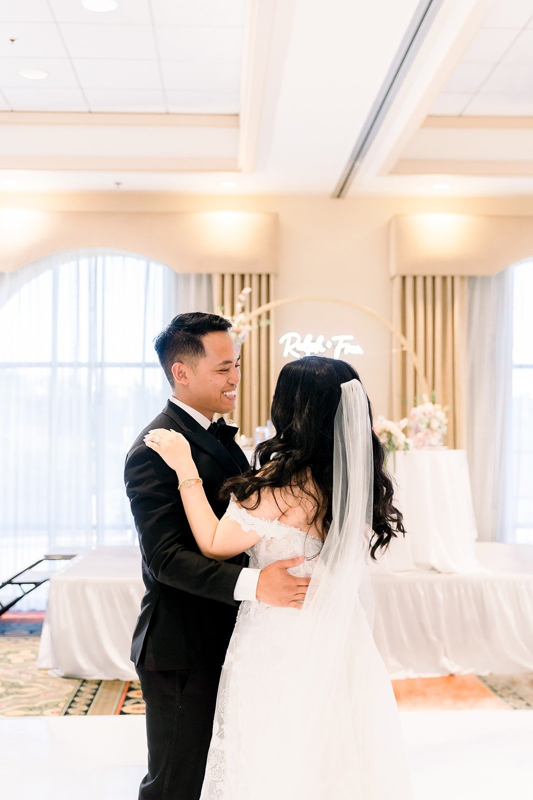 Ralph holding Francesca close during their first dance