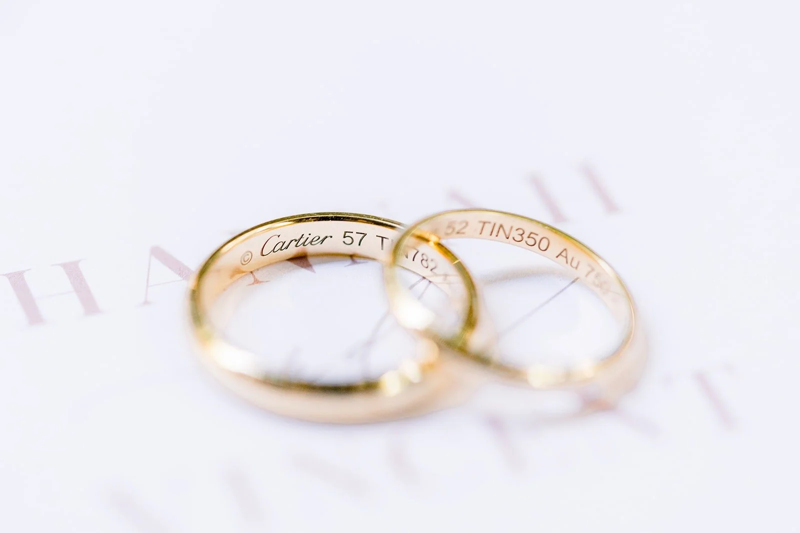 Hannah and Vincent's wedding bands side by side