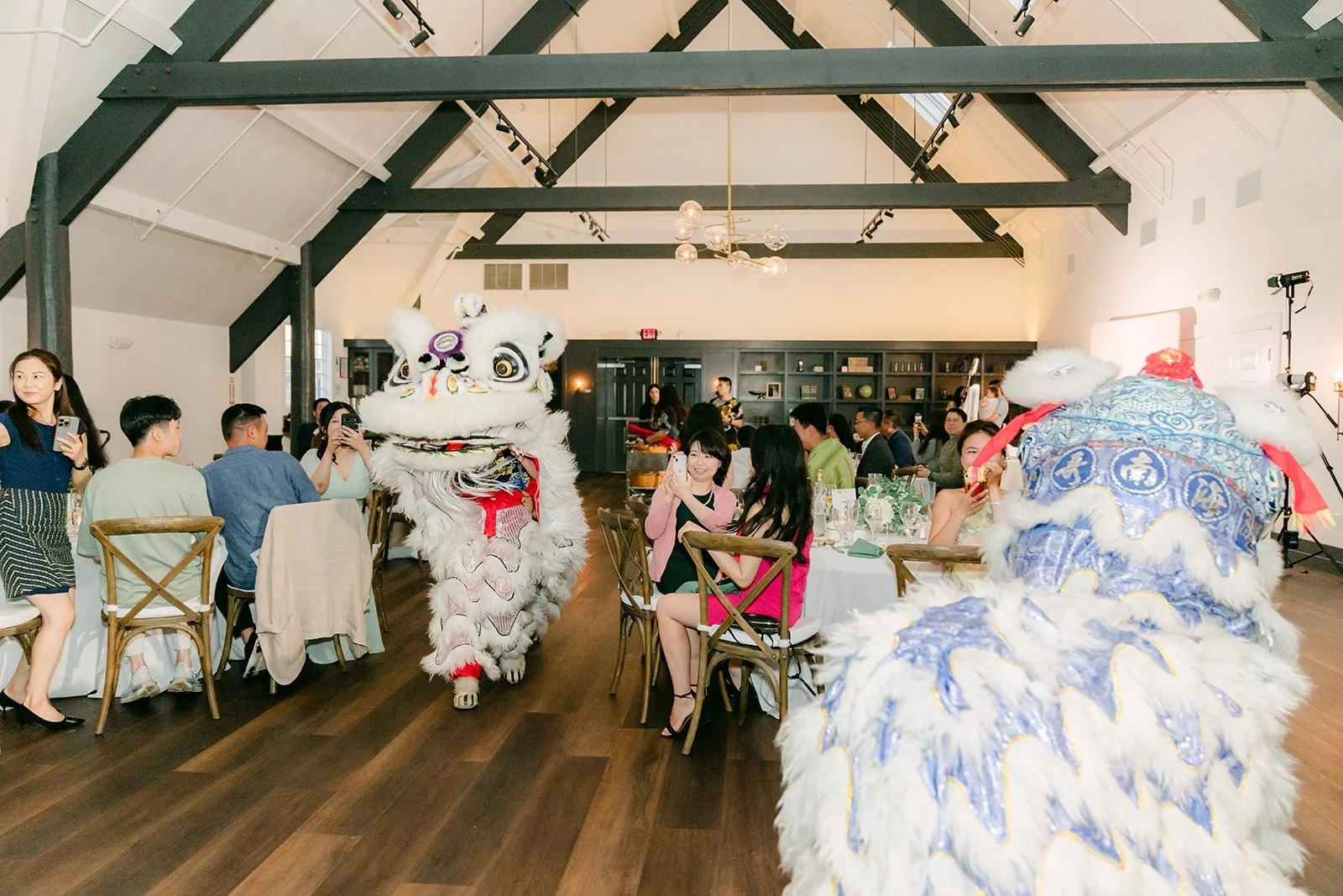 The lion dance entering the ballroom