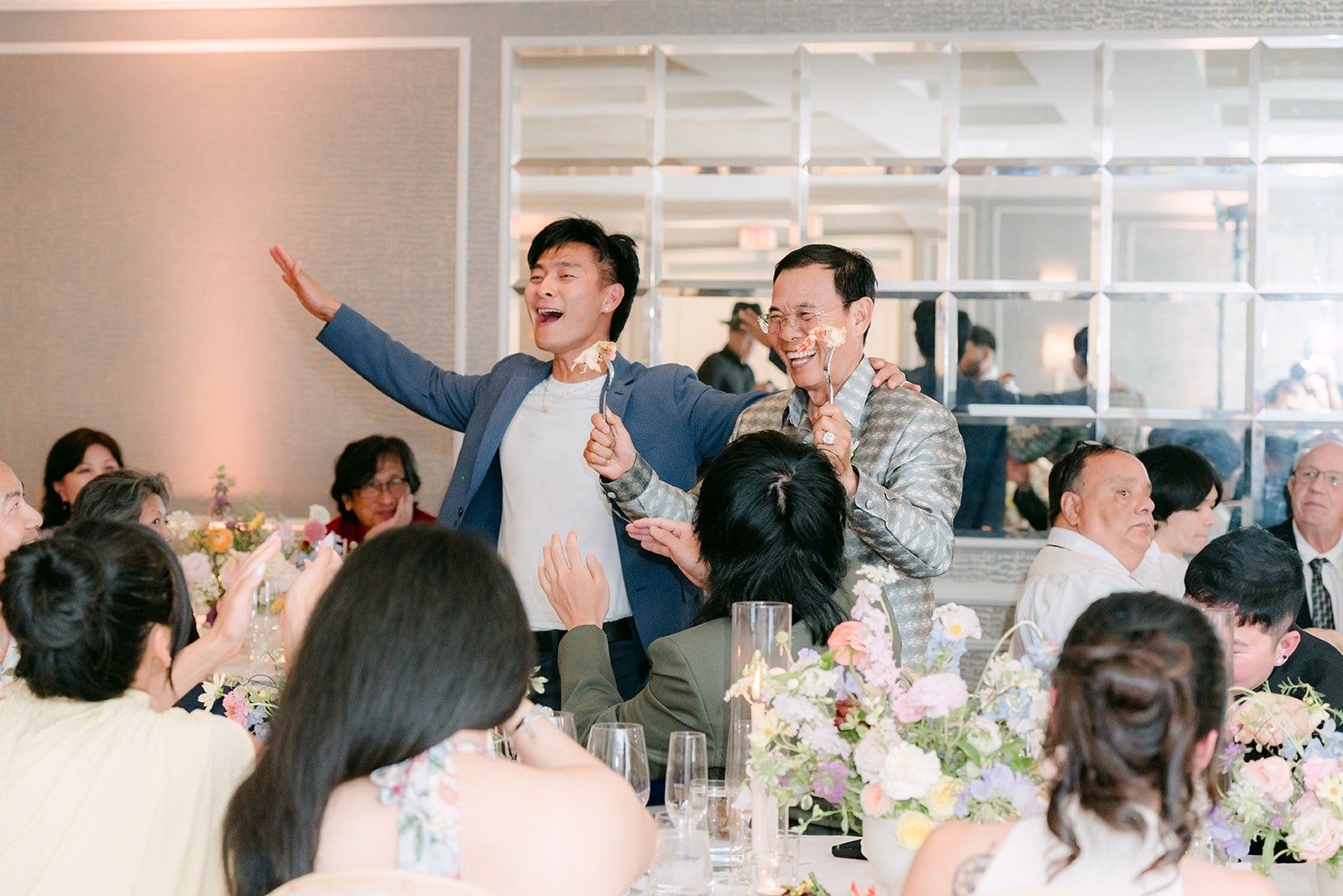 Friends cheering from their table during the speeches