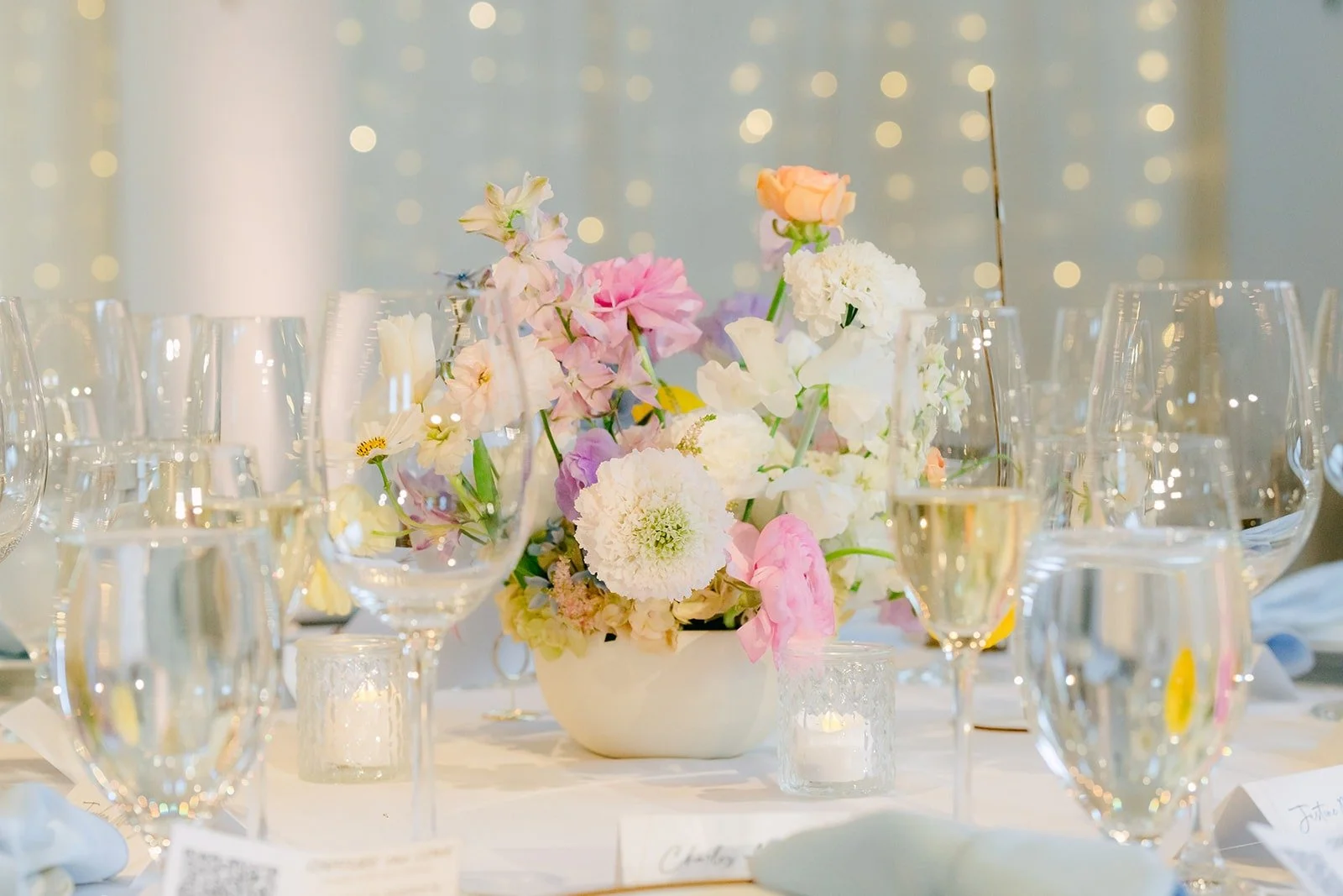 A pastel centerpiece on a reception table