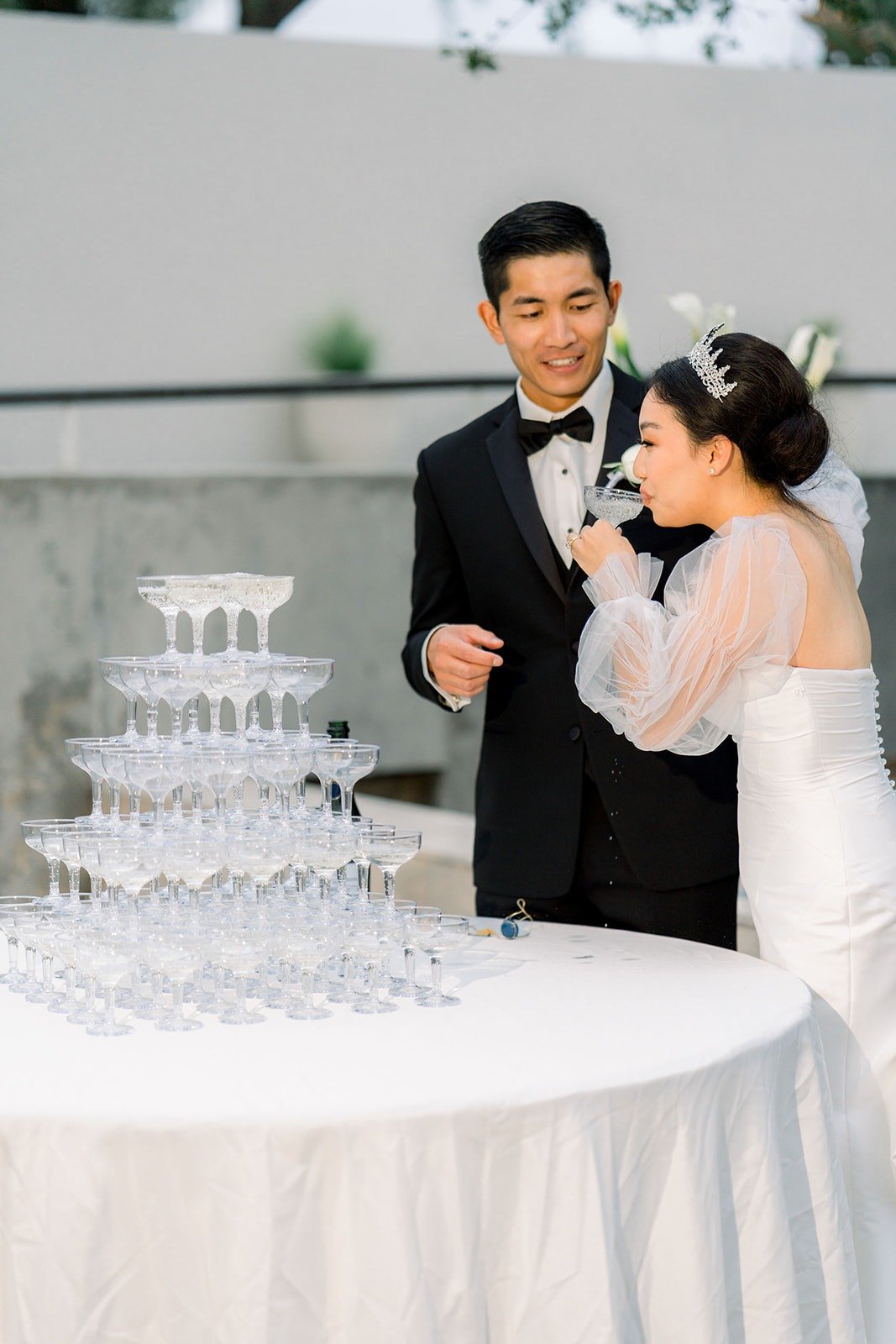 Steven and Jacinda celebrate at the champagne tower