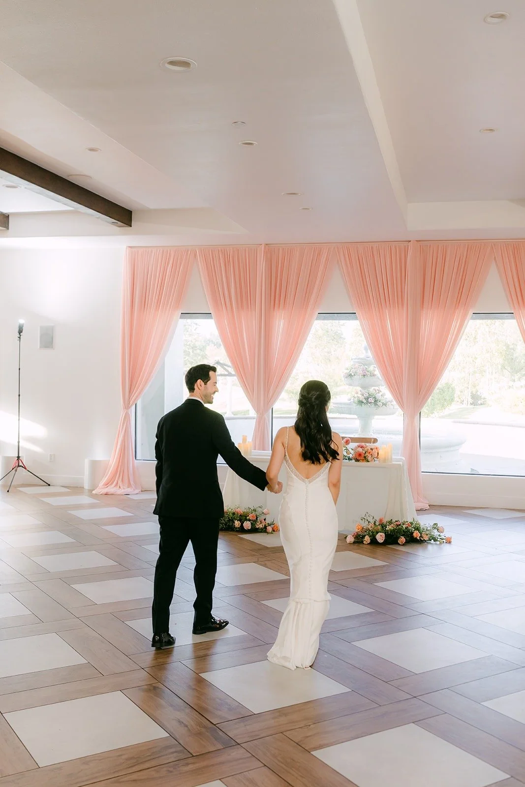 A wide view of the first dance in the reception room at Sterling Hills