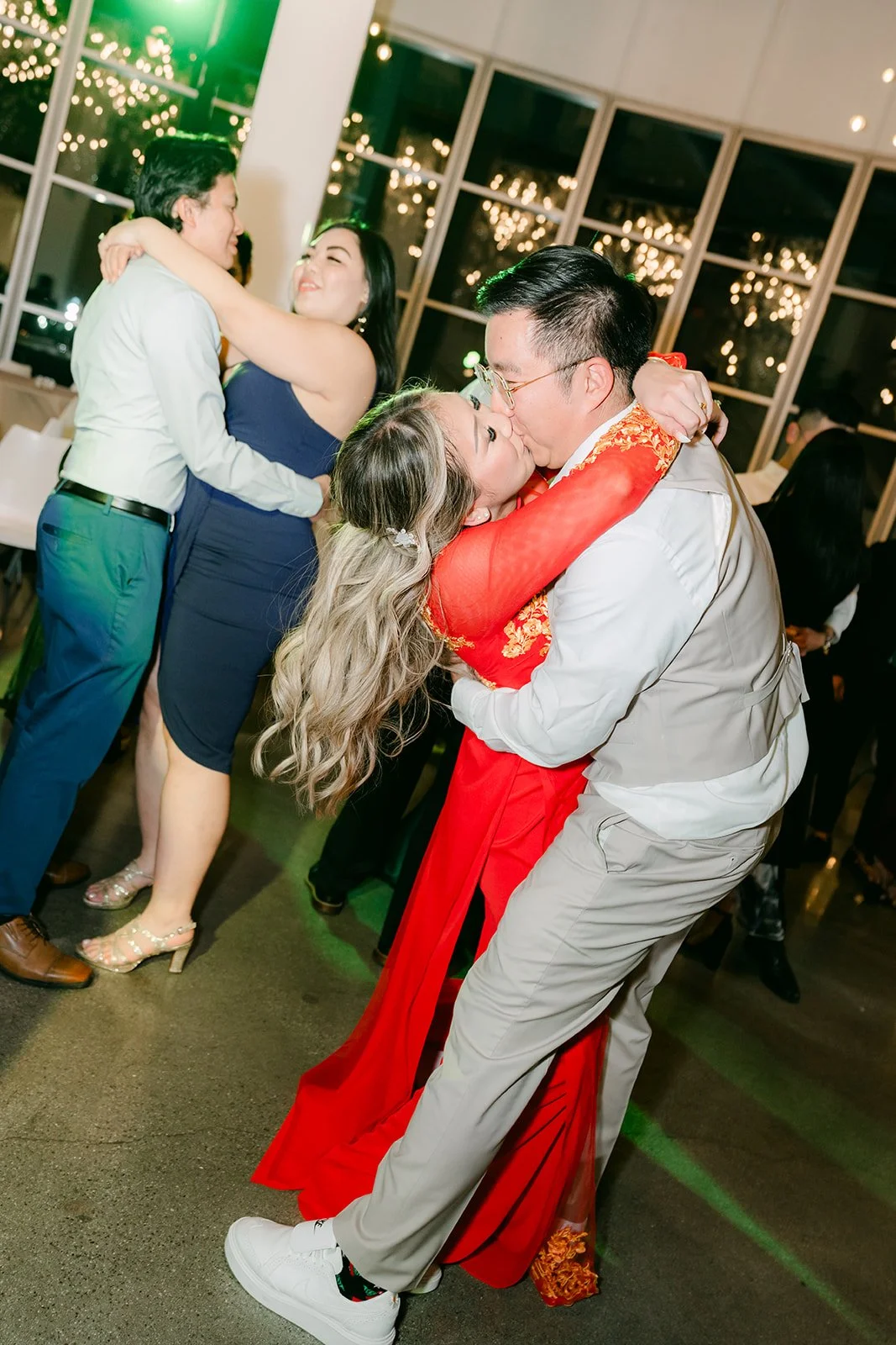 Ricky dipping Raine for a kiss on the dance floor