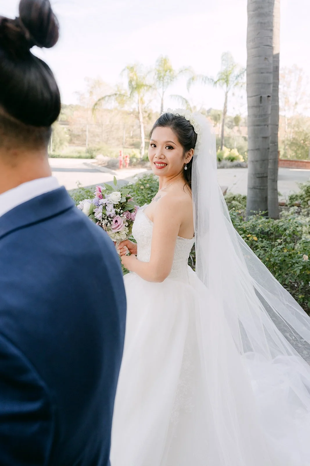 Michael smiling as Kate walks up for their first look.