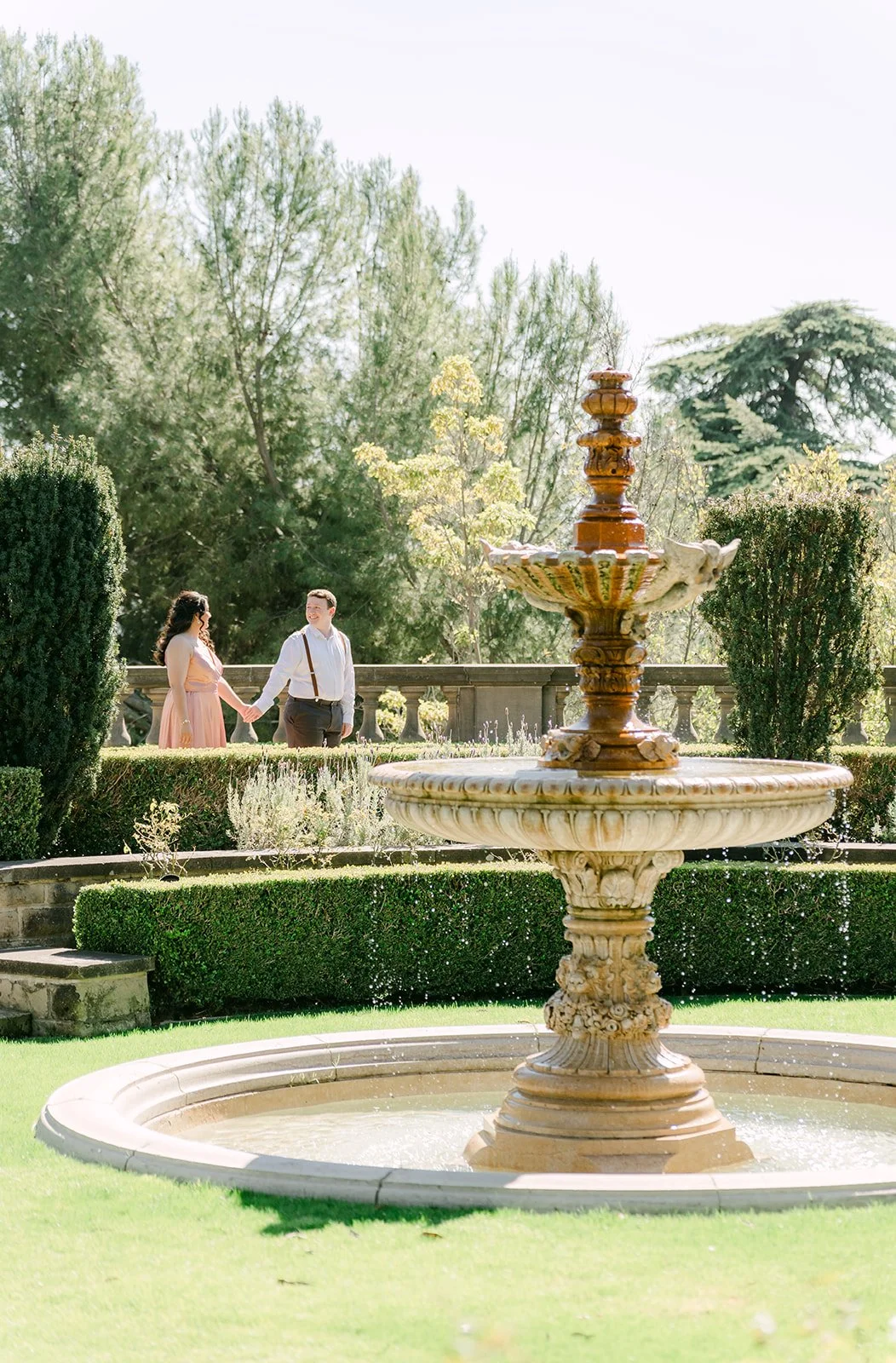 Tiered stone fountain in the formal garden at Greystone Mansion.