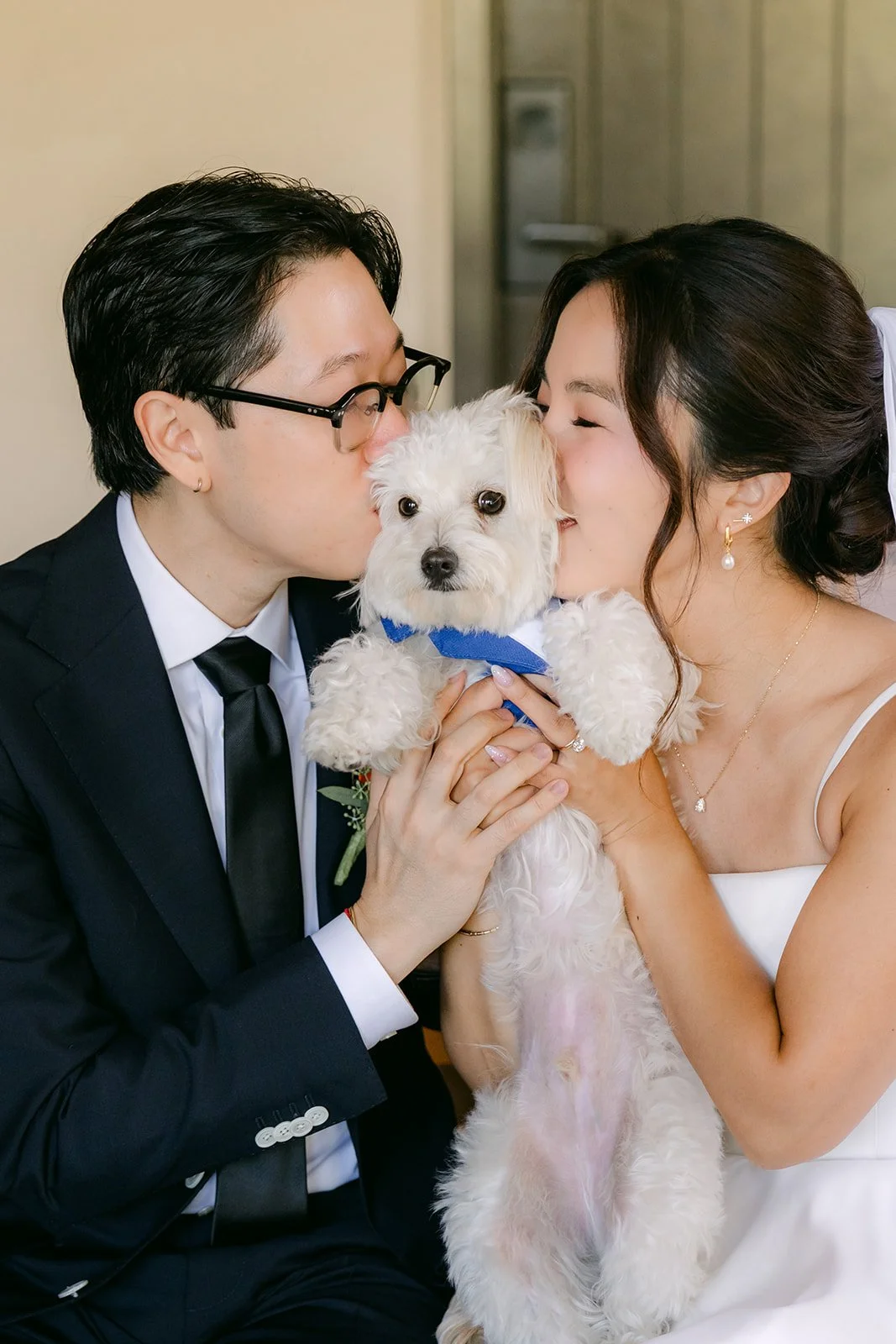 A kiss shared over the pup