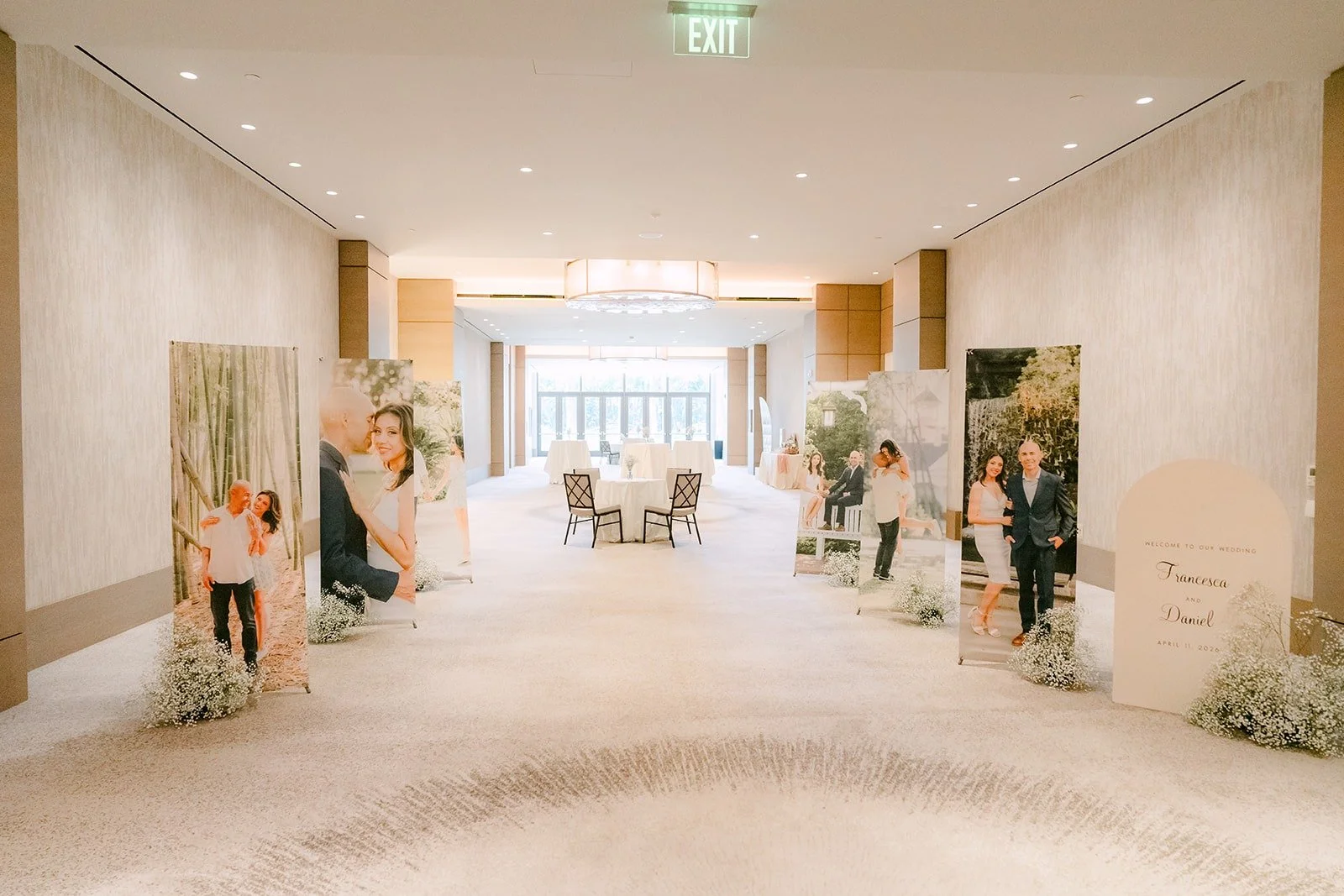 Engagement photos lining the entrance to the Carousel Ballroom, photographed by One and Only Production