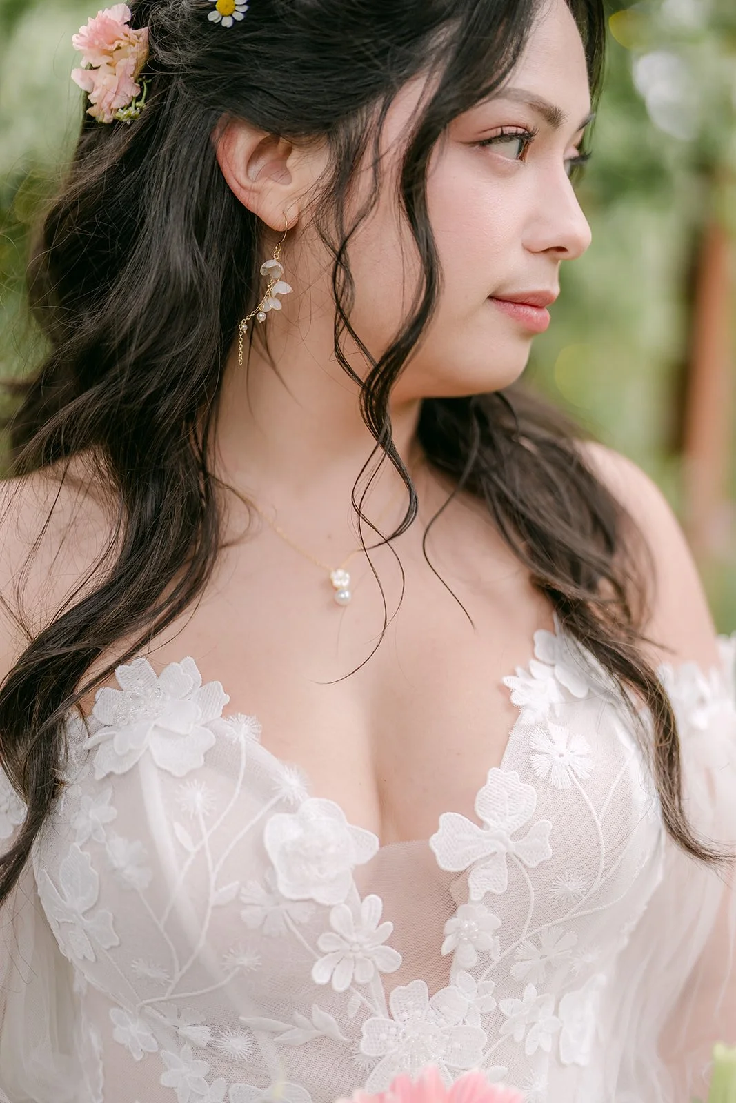 Bridal portrait of Kat in a lace off the shoulder gown with daisies in her hair