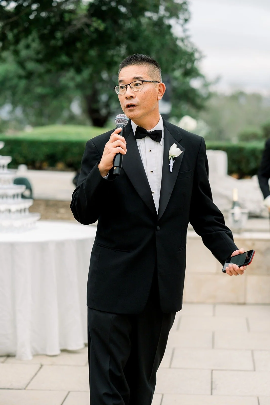 The host gives a speech on the patio