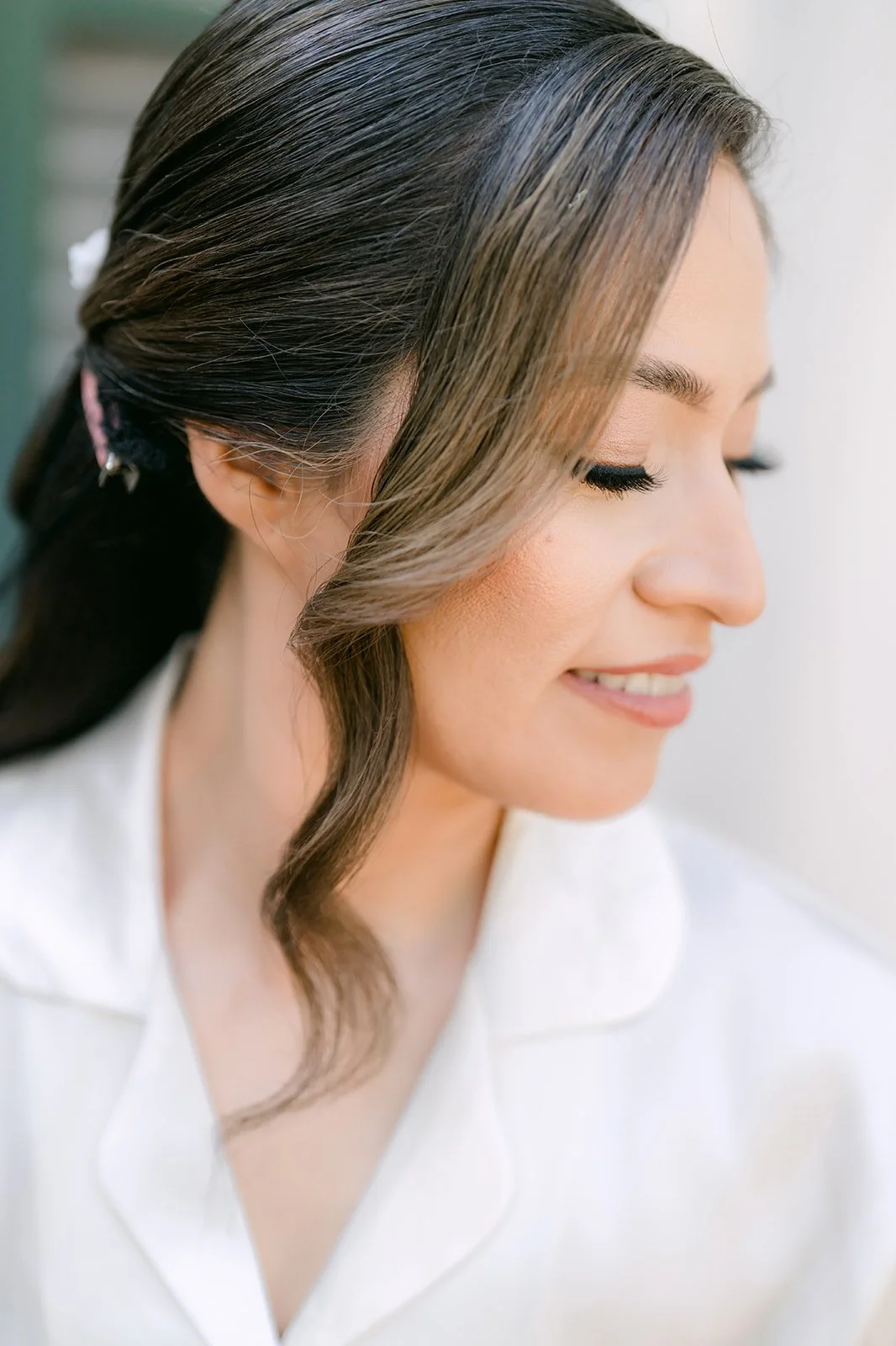 Close up of Mariana's hair and makeup in soft window light