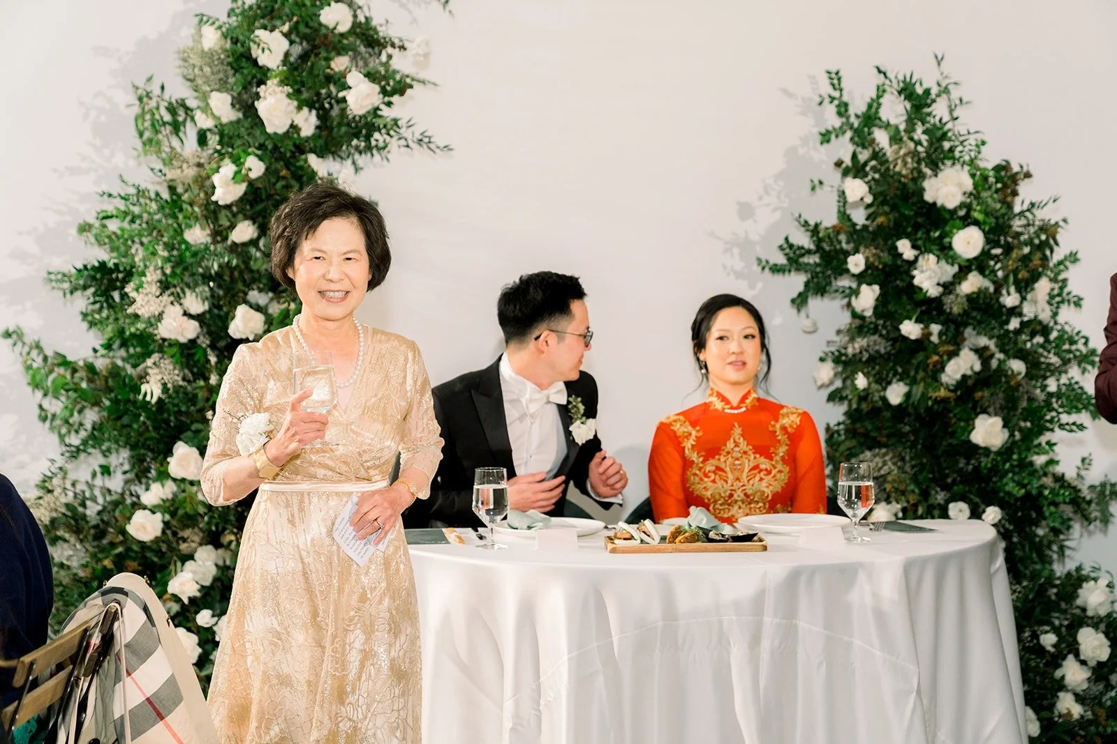 A family member speaks at the sweetheart table