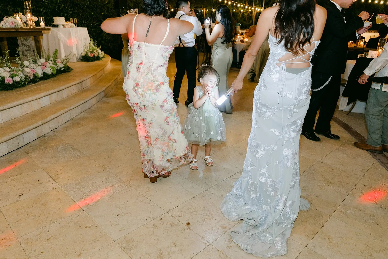 Guests dancing on the patio as the open dancing begins at Eden Gardens.