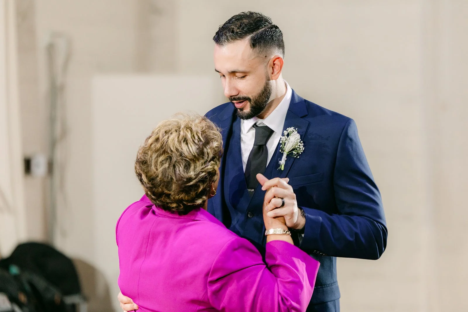 Danny and his mom smiling at the end of their dance