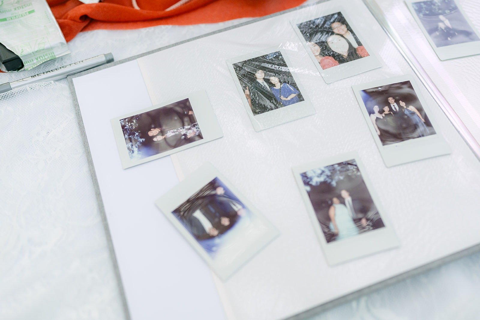 Printed photos of Shayna and Robert set out for guests