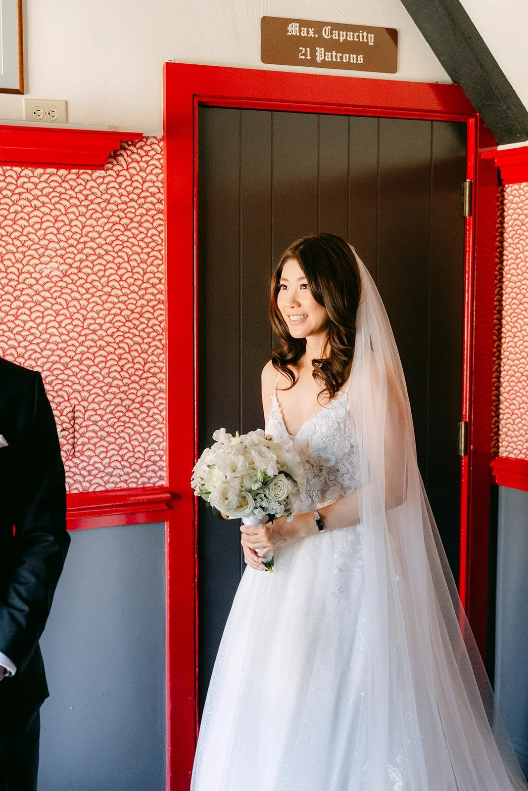 Valerie smiling as Jason sees her in her gown