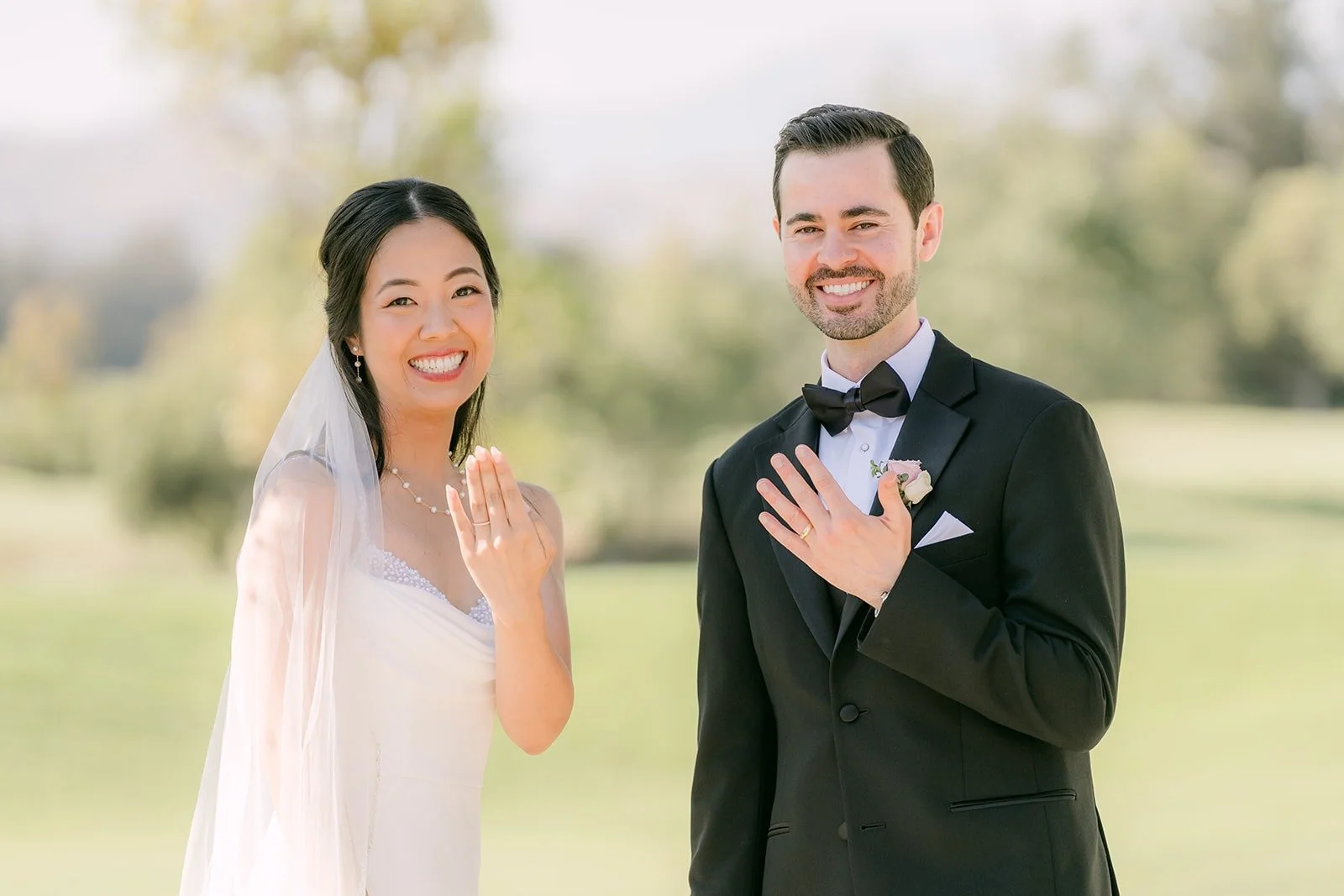 Stephanie and Kevin laughing during the ceremony
