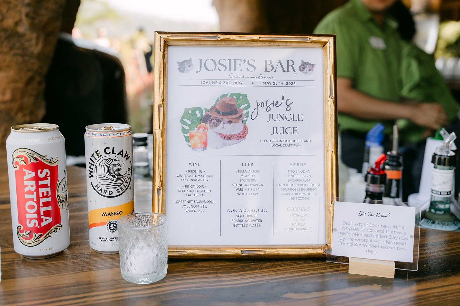 The Josie's Bar menu sign at the bar with canned drinks