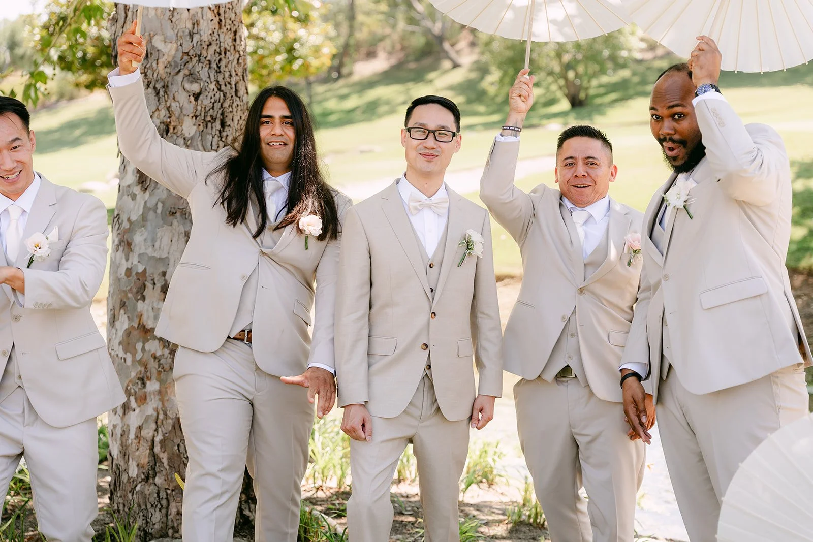 Kevin and his groomsmen cheering at Coyote Hills Golf Course, photographed by One and Only Production.