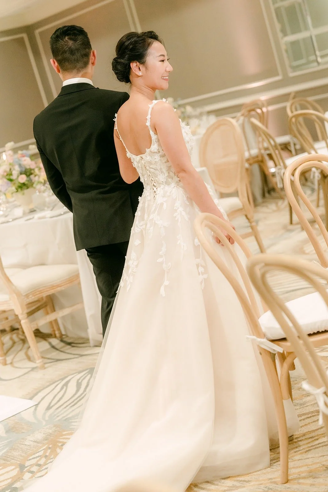 Kylie and Mario walking into the ballroom for their room reveal