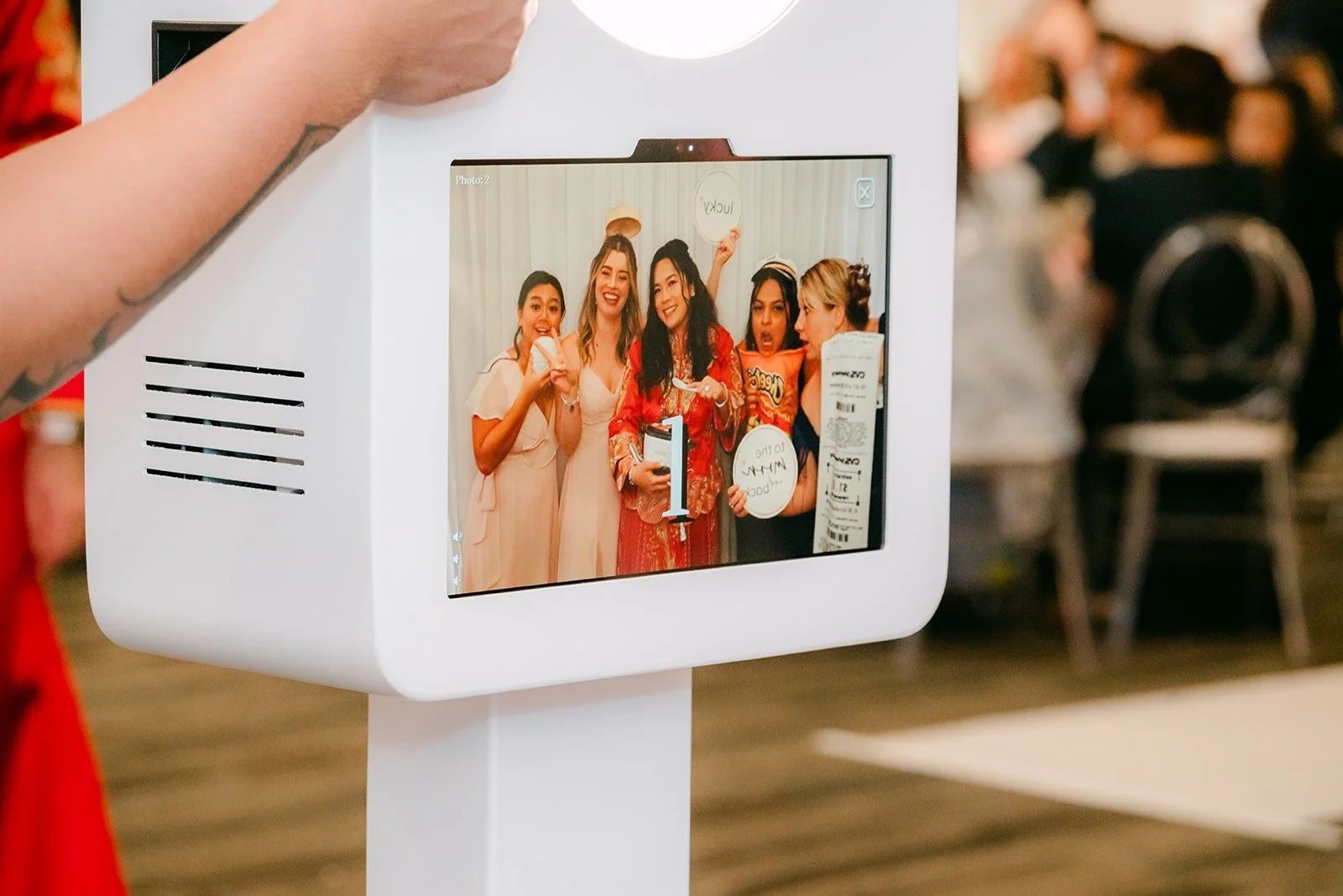 Guests checking their photo on the booth screen