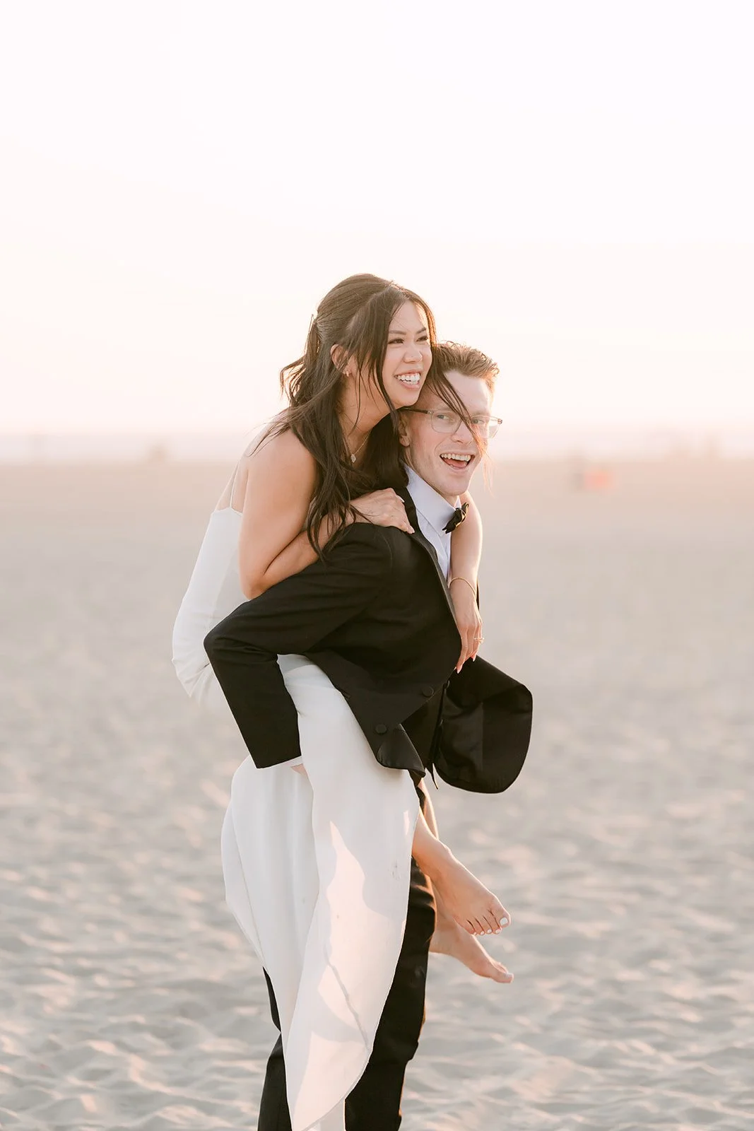 Justine carrying Matthew piggyback