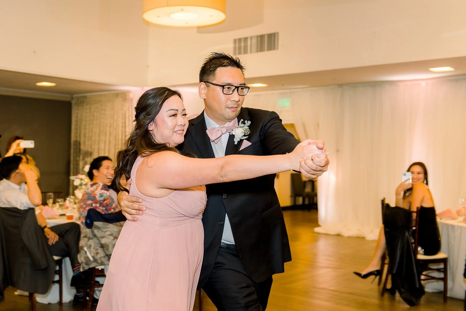 Members of the wedding party making their grand entrance