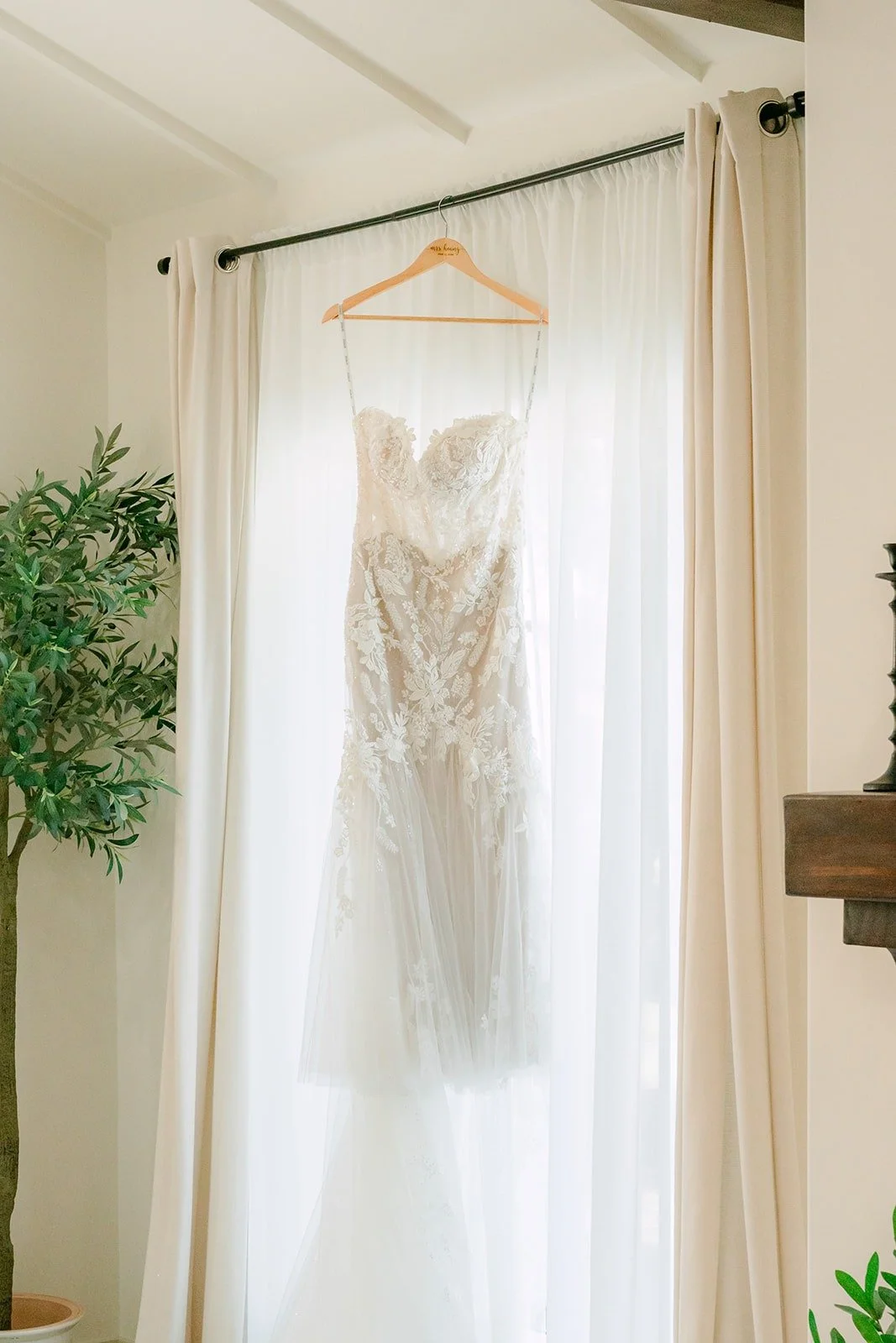 Candice's lace gown hanging in the window of the Alhambra Airbnb