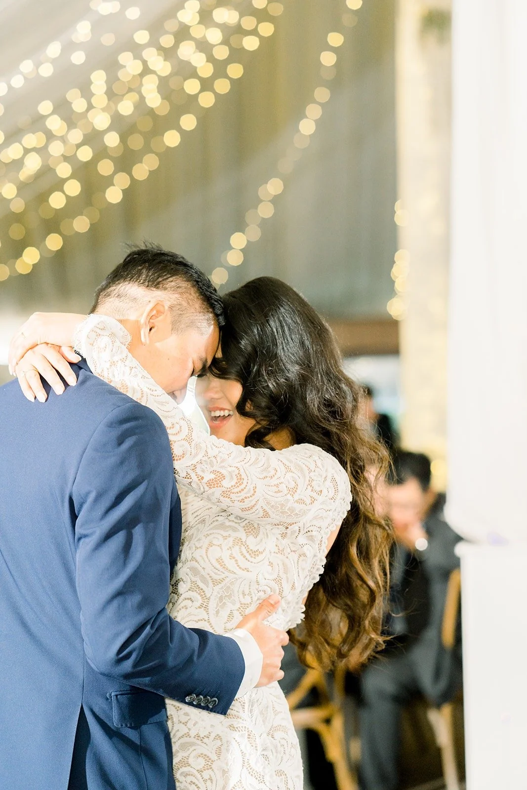 Vincent holding Hannah close on the dance floor