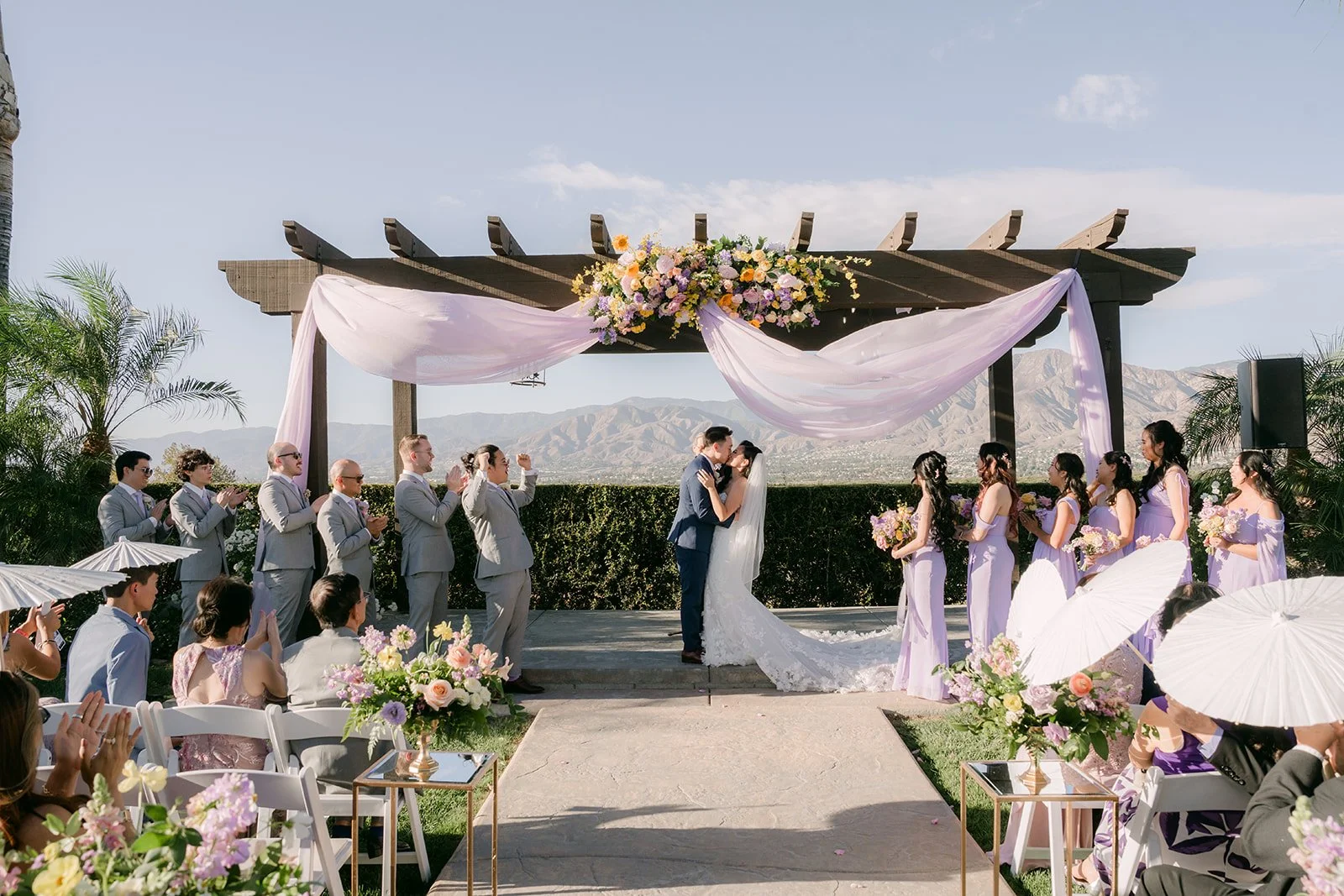 Wide view of the ceremony from the back of the aisle.
