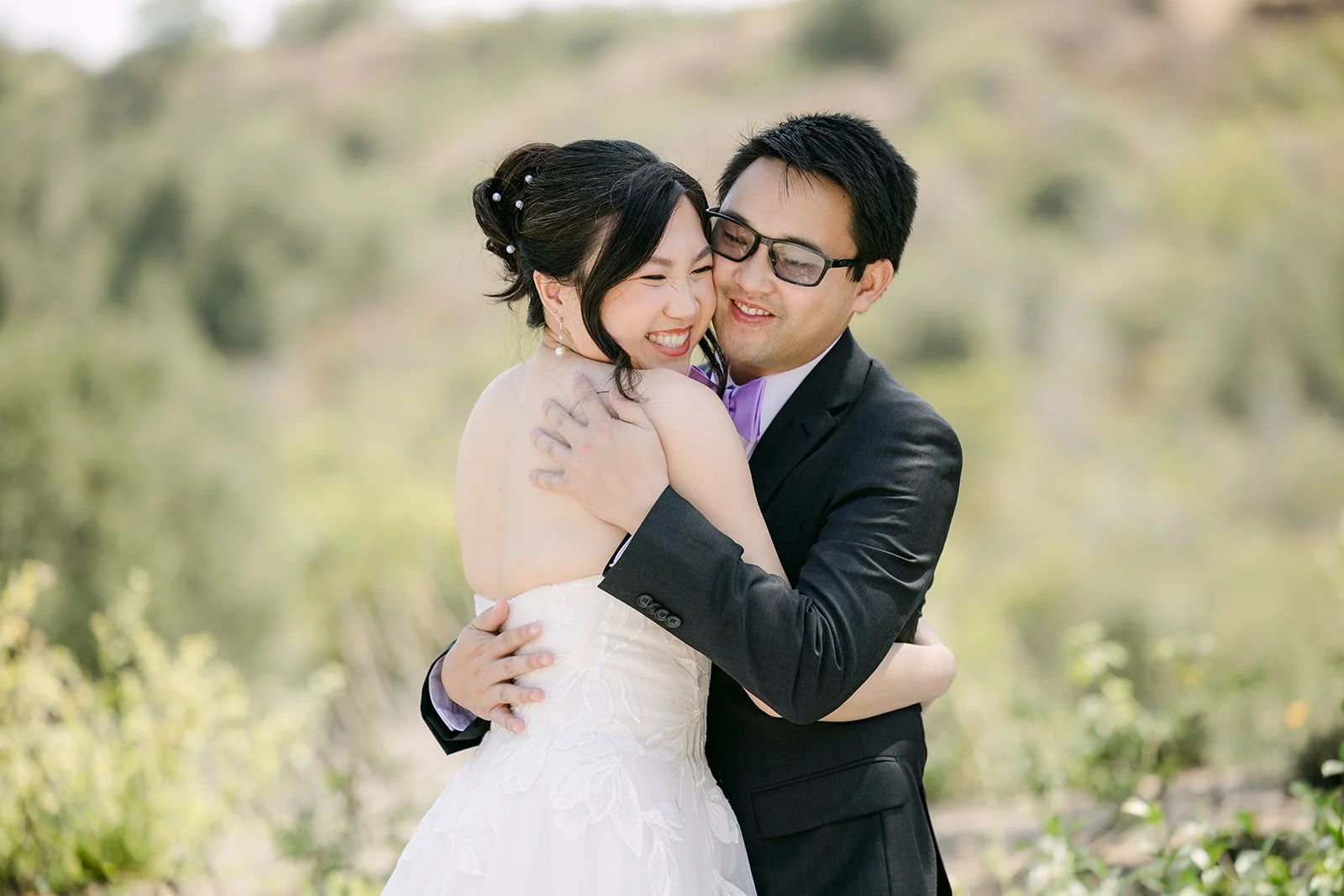 Mary and Patrick embracing at their first look