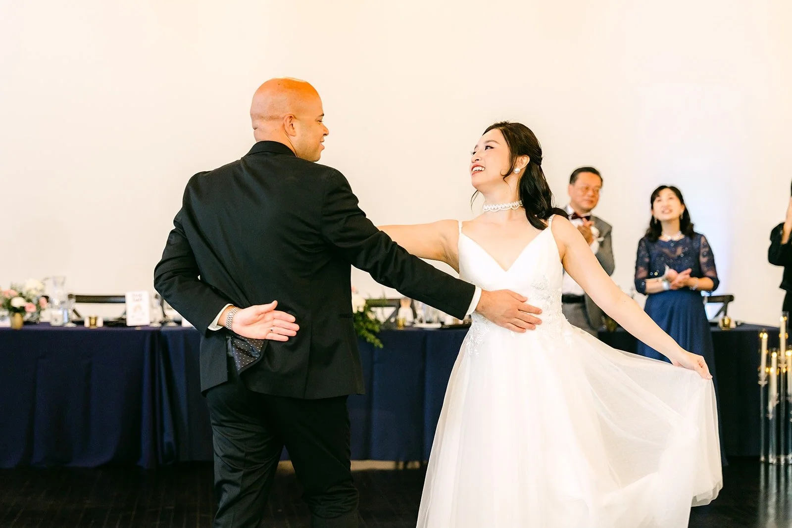 Brandon and Elisa mirror each other on the dance floor