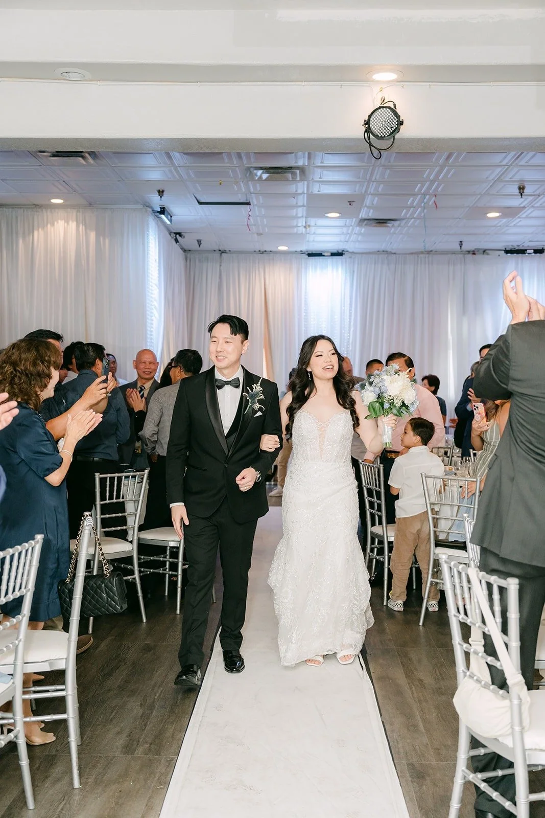 Emily and James making their grand entrance at Paracel Events