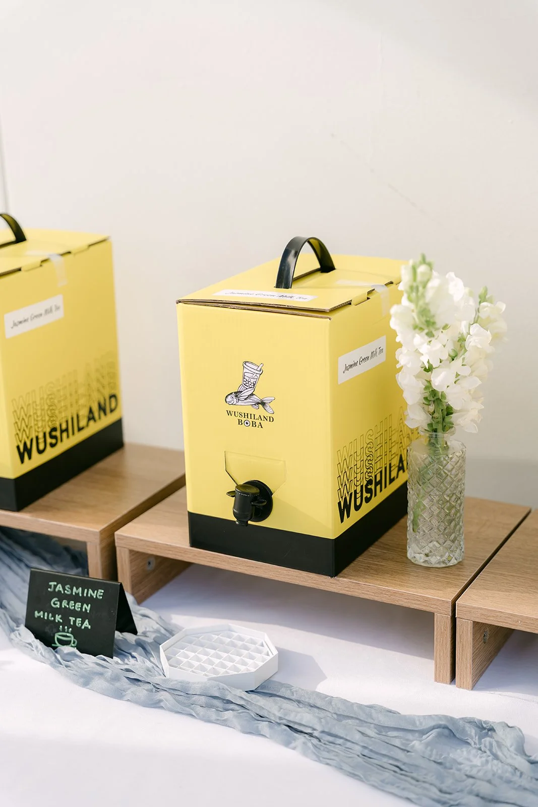 Wushiland boba dispensers at the reception