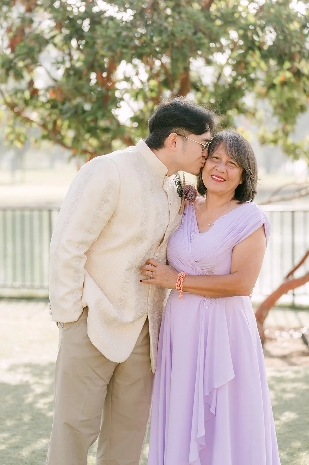 Jacob kissing his mom's cheek