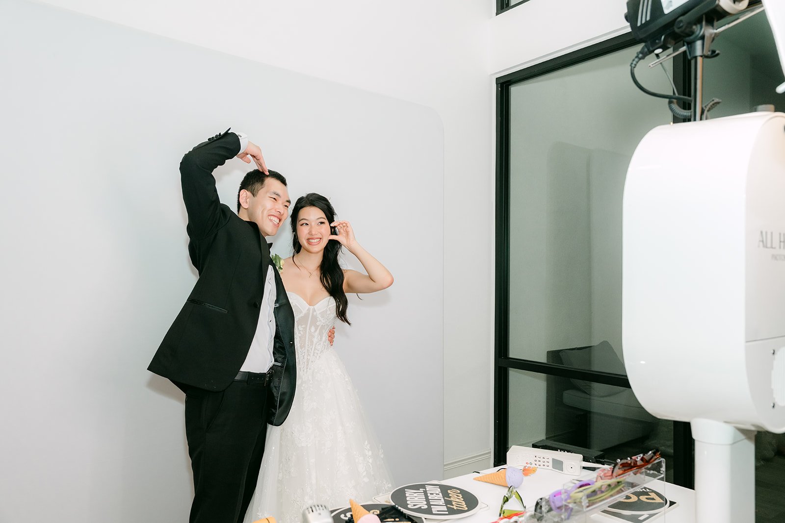 Clarissa and Austin in the photobooth