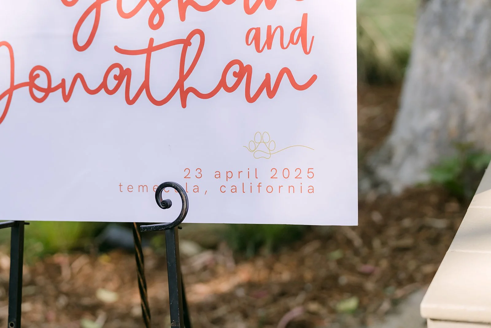 Coral script welcome sign for Yishan and Jonathan