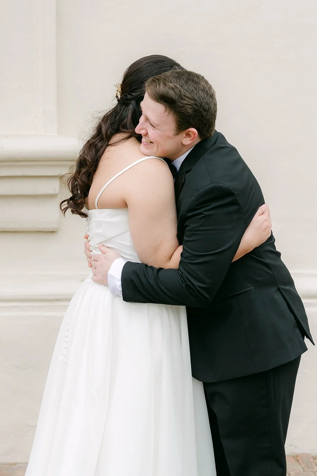 Saira and Matthew hugging during their first look