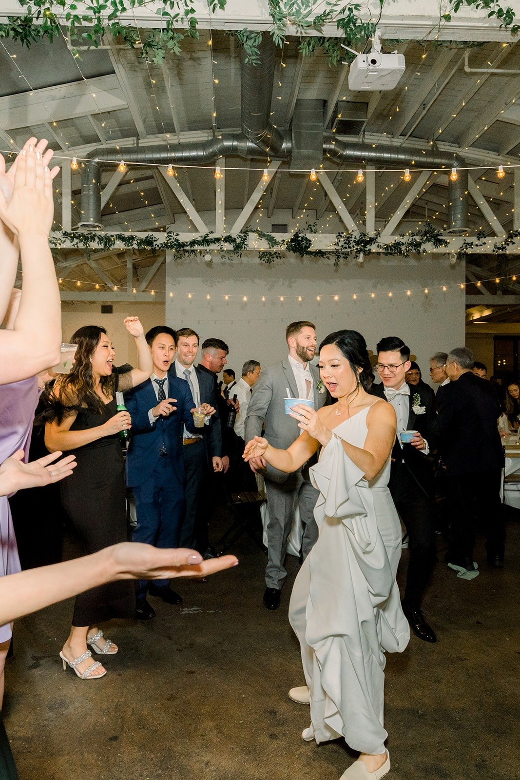 Cindy dances in a white second look
