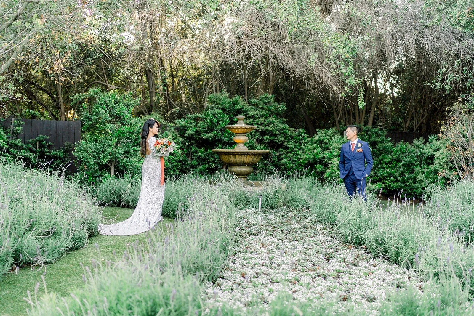 Hannah and Vincent walking through the lavender garden