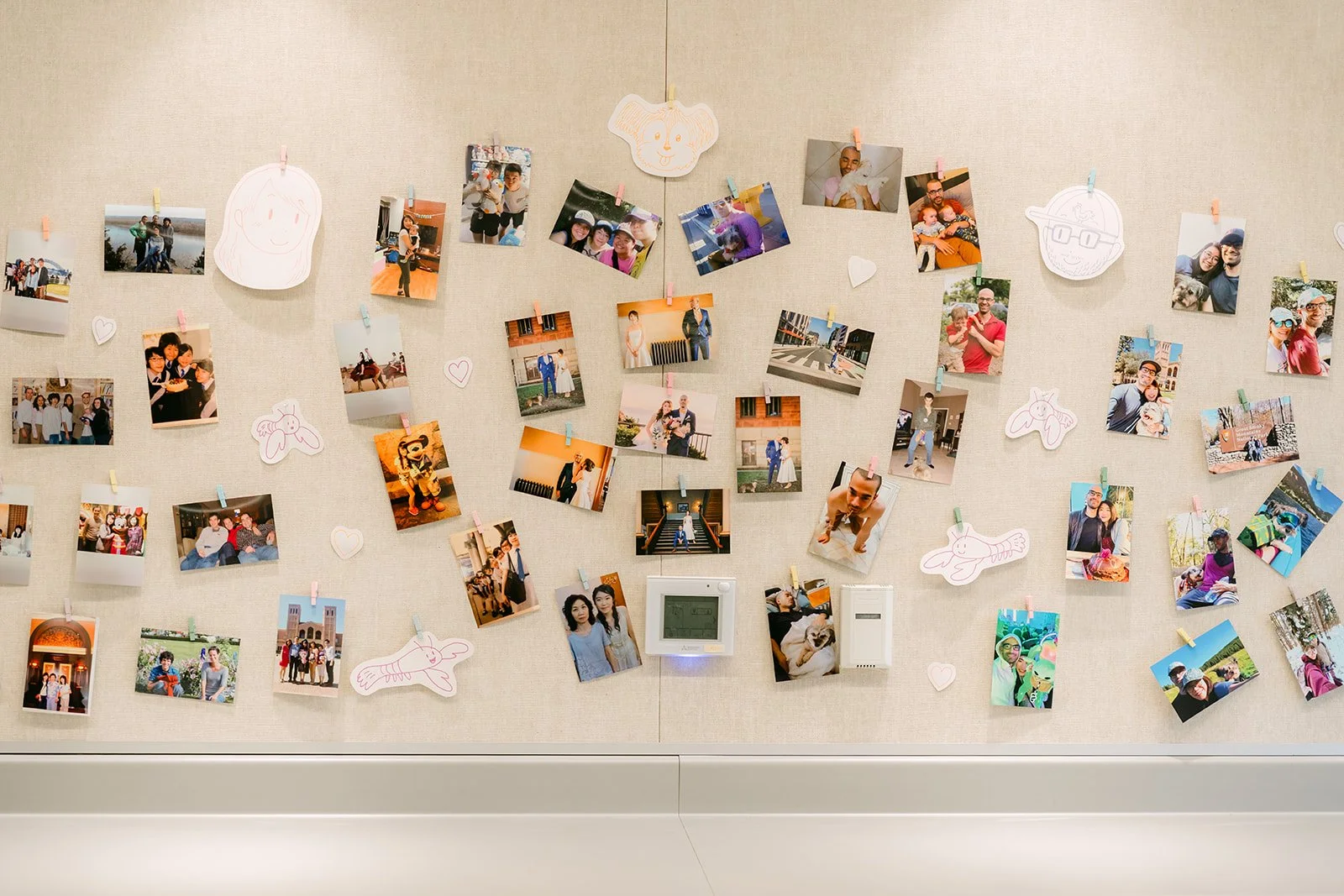 A wall of photos of Christie and Christian for guests to browse.